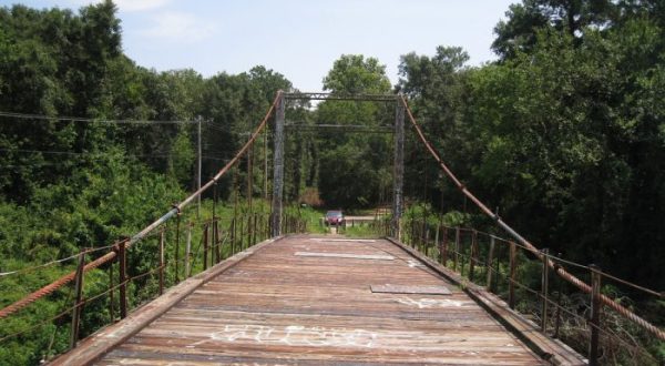 There’s Something Incredibly Unique About This One Swinging Bridge In Mississippi