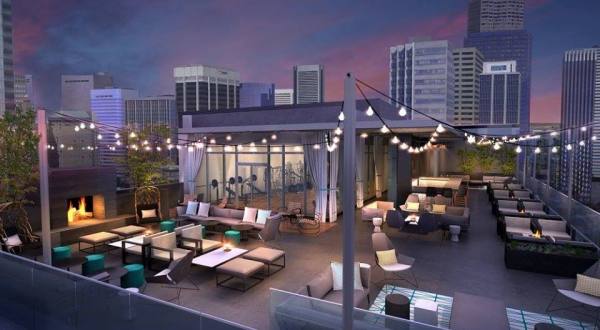 This Rooftop Bar In Denver Has A Crazy Cool View and Cozy Fire Pits