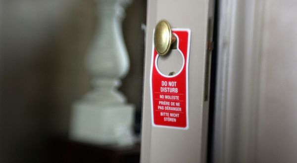 Hotel “Do Not Disturb” Signs Are Disappearing For A Disturbing Reason