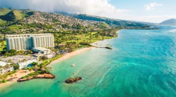 Watch Dolphins Play From Your Window At This Beautiful Seaside Hotel In Hawaii