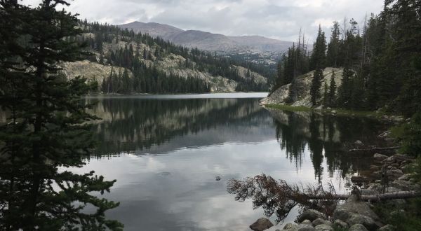 This Underrated Trail In Wyoming Leads To A Hidden Turquoise Lake