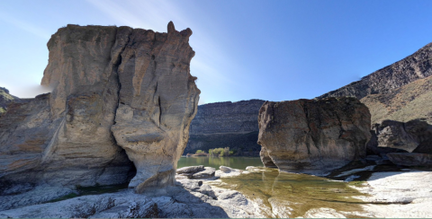 Paddle Right Up To This Brilliant Waterfall In Idaho That's Surrounded By Geologic Wonders