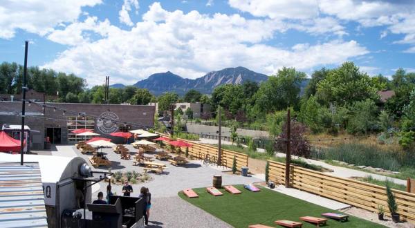 The Outdoor Beer Garden In Colorado That’s Located In The Most Unforgettable Setting