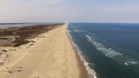 Sink Your Toes In The Sand At The Longest Beach In Maryland