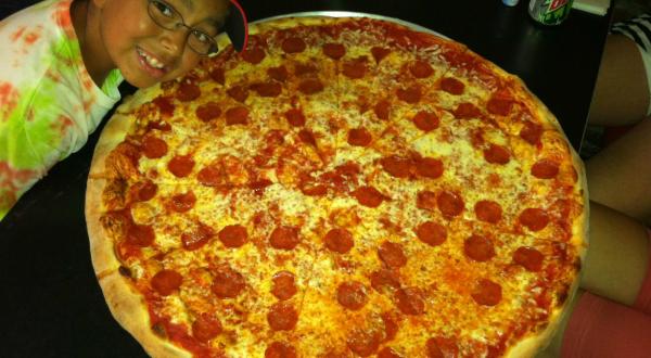 The Pizza At This Delicious South Carolina Eatery Is Bigger Than The Table