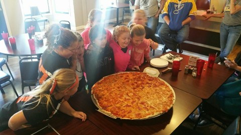 The Pizza At This Delicious Missouri Eatery Is Bigger Than The Table