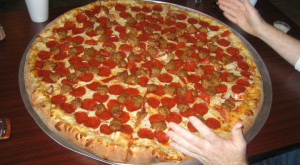The Pizza At This Delicious Wisconsin Eatery Is Bigger Than The Table