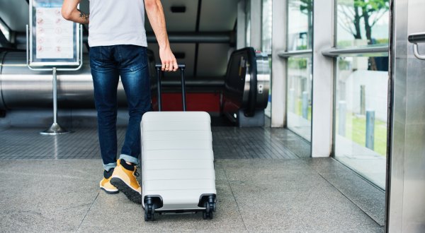 Here’s The Deal With Wrapping Your Luggage In Plastic