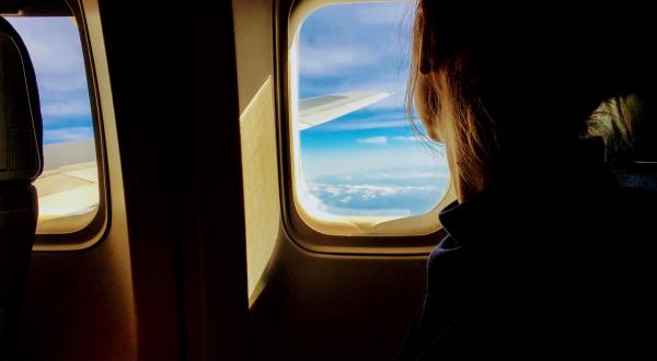 The One Thing You Should Be Doing To Relax On Planes, According To Science