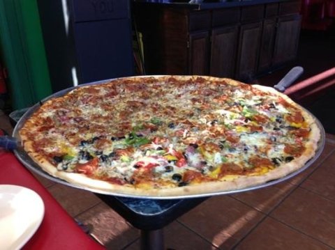The Delicious Mississippi Restaurant With The Biggest Pizzas We've Ever Seen