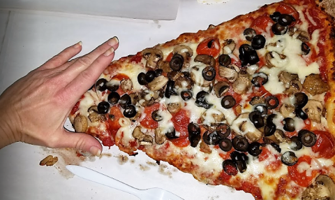 The Delicious Maryland Restaurant With The Biggest Slices Of Pizza We've Ever Seen