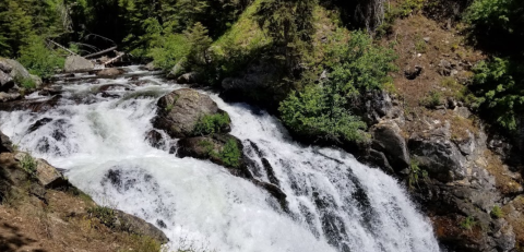 Feel The Mist On Your Face With This Brief 3-Mile Hike To A Towering Waterfall In Idaho