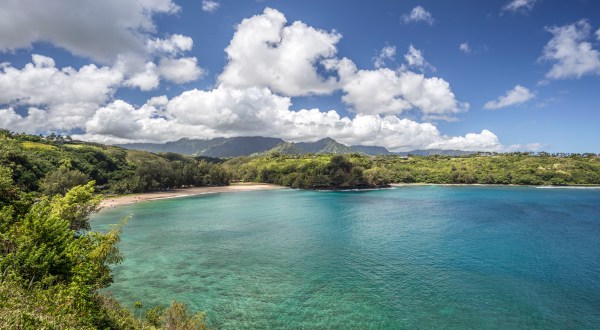 The Breathtaking Hawaii Beach Surrounded By Lava Cliffs That’s Tailor Made For Summer