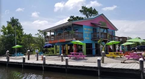 Dine In A Tropical Wonderland At Mississippi’s Most Colorful Waterfront Restaurant