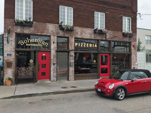 The Best Wood Fired Pizza In Oklahoma Is Hiding Behind These Red Doors
