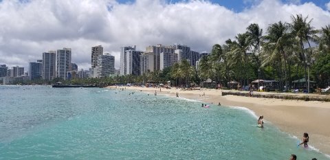 Snorkelers And Bodyboarders Flock To The Unbeatable Queen's Beach In Hawaii