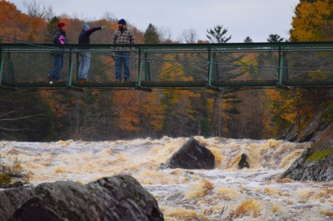 Walk Across The Swinging Bridge For A Gorgeous View Of Minnesota's Fall Colors
