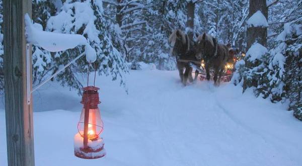 Take A Lantern-Lit Sleigh Ride To A Winter Speakeasy In New York At The Oldest Operating Lodge In The Adirondack Park