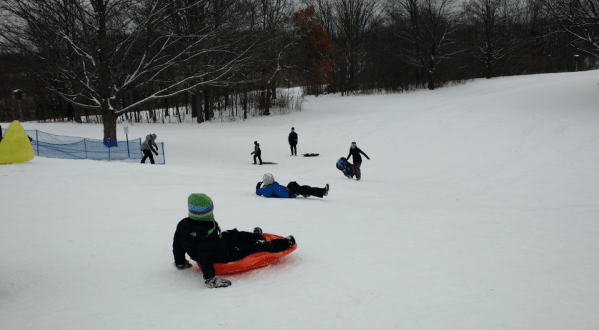 Here Are the 9 Best Places To Go Sled Riding Around Detroit This Winter