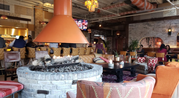 Enjoy An Unforgettable Meal In Front Of A Gigantic Fireplace At Gran Castor Near Detroit