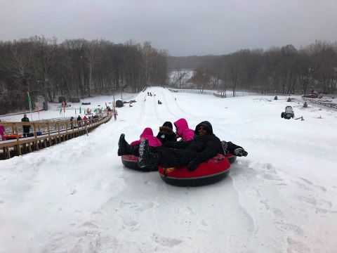 Zip Down A 600-Foot Snow Tubing Hill At Hawk Island Park In Michigan