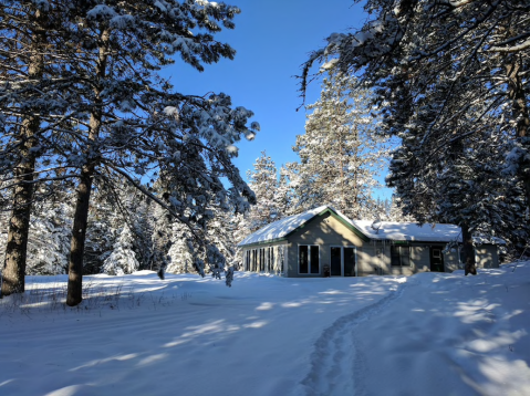 Warm Up This Winter With A Stay At A Cozy Minnesota Cabin In The Woods