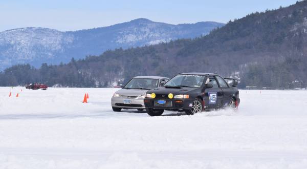 Toast Marshmallows On The Beach While Watching Ice Car Races At Lake George Winter Carnival In New York