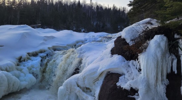 A Snowy Hike Through The Woods At Minnesota’s Judge C. R. Magney State Park Leads To A Spectacular Frozen Waterfall