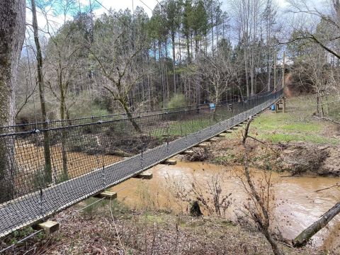 Walk Across A 180-Foot Suspension Bridge On Twelve Mile Creek Trail In South Carolina