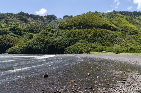 Experience Endless Natural Beauty At Honomanu Bay, One Of Hawaii's Prettiest Black Sand Beaches