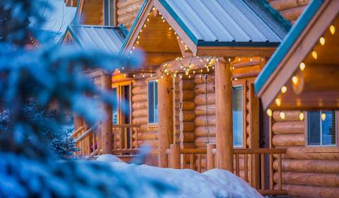 Explore The Forest On A Snowmobile, Then Snuggle Into The Cabins At Bear River Lodge In Utah