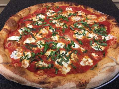 Choose From Over 25 Toppings To Make The Perfect Pizza At Ernesto's North End In Massachusetts