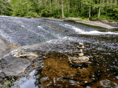 There's A Waterfall Hidden In Plain Sight In Rhode Island Where Two States Meet
