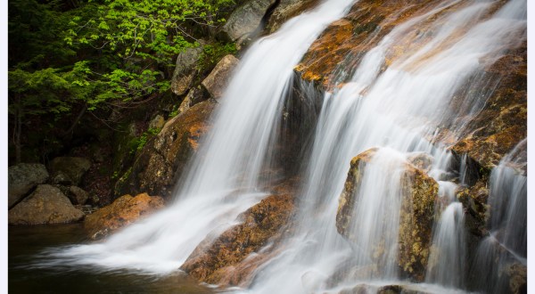 This 7-Tiered Forest Waterfall In New Hampshire Offers A Beautiful Woodland Experience