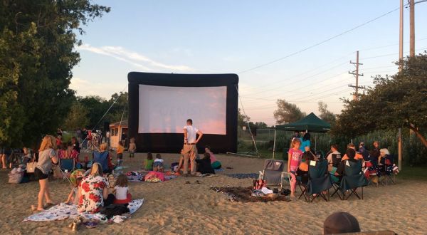 Watch Movies Outdoors On A Picnic Blanket In The Village Of Clarkson Near Detroit This Summer