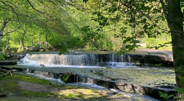 Plan A Visit To Stepstone Falls, Rhode Island’s Beautifully Blue Waterfall