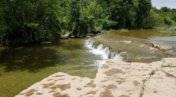 This Easy, 3.8-Mile Trail At Bull Creek Park Leads To One Of Texas’ Most Underrated Waterfalls