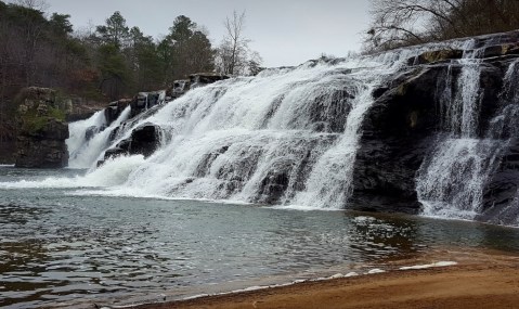 Plan A Visit To High Falls, Alabama's Beautifully Blue Waterfall