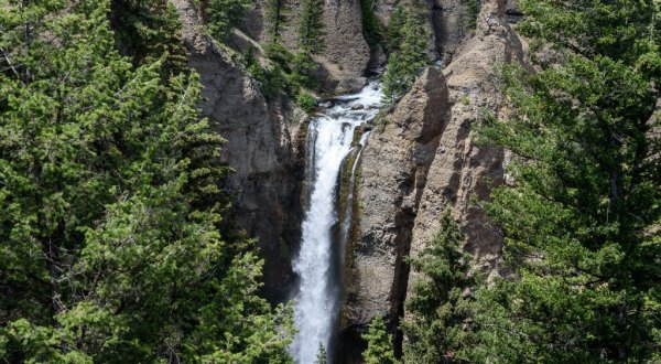 Plan A Visit To Tower Fall, Wyoming’s Beautifully Blue Waterfall