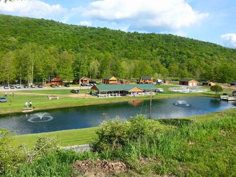 Unwind By A Shimmering Creek And Stay At The Cabins At Creekside Resort For A Relaxing Pennsylvania Retreat