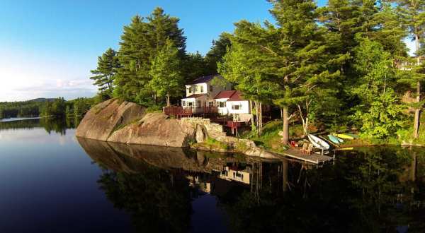 Forget The Resorts, Rent This Charming Waterfront Cottage In New Hampshire Instead