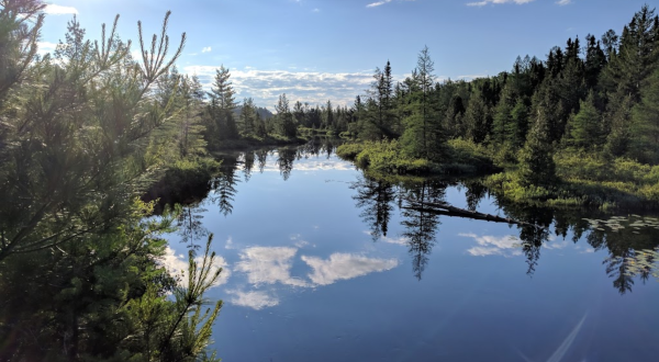 Get A Million Miles Away From It All At The Peaceful And Remote Craig Lake State Park In Michigan