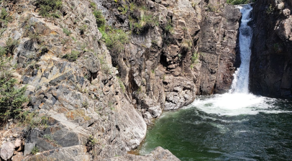 Swim Underneath A Waterfall At This Refreshing Swimming Hole In Colorado