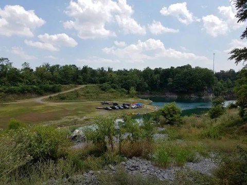 Camp On The Banks Of A Beautifully Blue Quarry Lake At Compound Nature Preserve In West Virginia