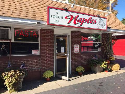 A Touch Of Naples Pizza & Pasta In New York Serves Massive Slices Of Pizza
