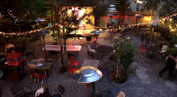 Enjoy A Delicious Meal In An Enchanting Courtyard At Bacchanal In New Orleans
