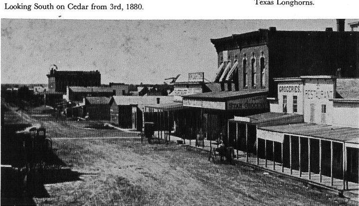 Photo from 1880, looking south on Cedar street from 3rd.