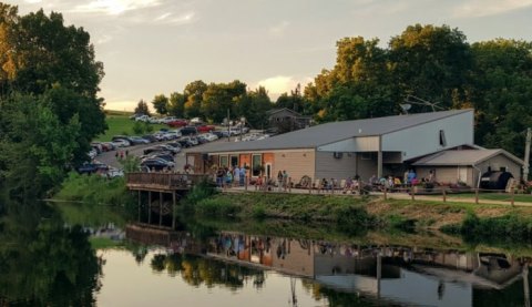 Dine While Overlooking A Waterfall At Bluff Lake Catfish Farm In Iowa