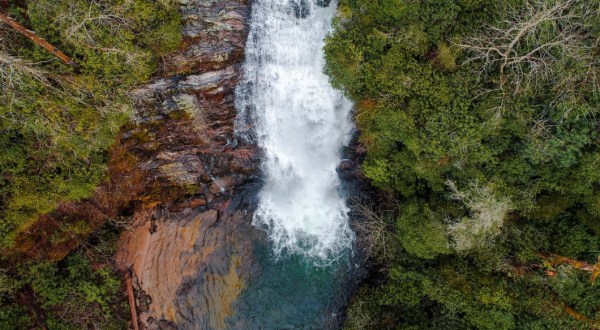 Plan A Visit To Secret Falls, North Carolina’s Beautifully Blue Waterfall