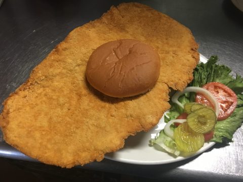Lucky's Cafe In Missouri Serves Scrumptious Tenderloin Sandwiches Bigger Than The Plate